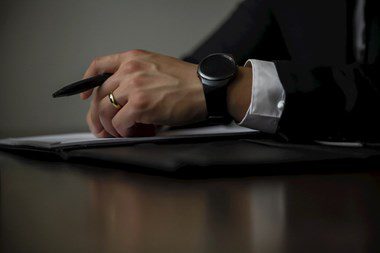 reading and signing legal document